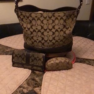 Coach bag is real I paid over $800 for it years ago , wallet I paid almost 400..